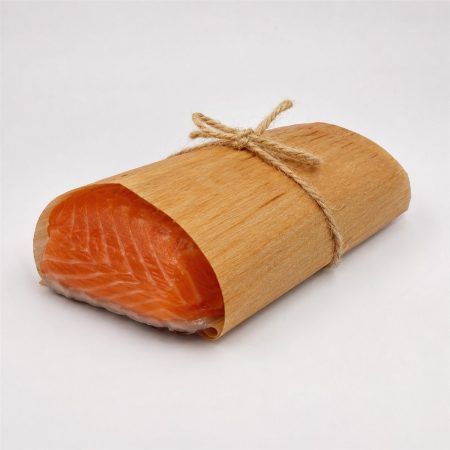 Salmon fillet wrapped in a cedar sheet tied with twine