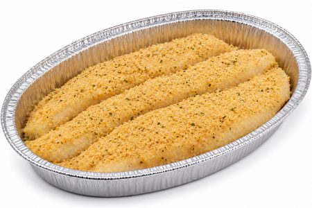 Breaded turbot fillets in a foil baking pan